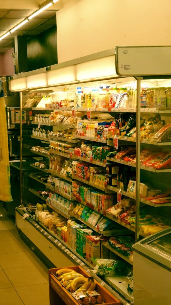 pexels-photo-26856669 Wide variety of grocery items displayed on shelves in a supermarket in Ho Chi Minh City, Vietnam.
